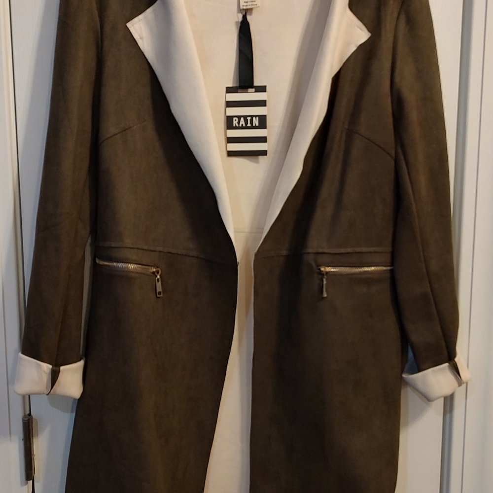 3/4 length coat olive green with light cream trim on sleeves and inside. Has the